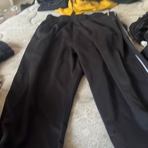 Black joggers with white strips going down each side in size XXL